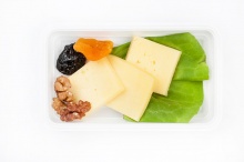 Cheese plate with dried fruits